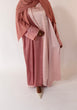 Load image into Gallery viewer, Women&#39;s reversible 2-in-1 abaya 3-piece set in pink and light pink. Includes an outer abaya, underdress, and matching hijab in a darker pink shade. Versatile modest wear, perfect for any occasion. High-quality satin fabric, elegant design, and modest fashion essentials. One set, multiple ways to style.
