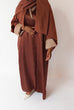 Load image into Gallery viewer, Women&#39;s reversible 2-in-1 abaya 3-piece set in brown. Includes an outer abaya, underdress, and matching hijab in a darker brown shade. Versatile modest wear, perfect for any occasion. High-quality satin fabric, elegant design, and modest fashion essentials. One set, multiple ways to style.
