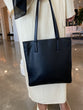 Load image into Gallery viewer, Black vegan leather tote bag with zipper closure
